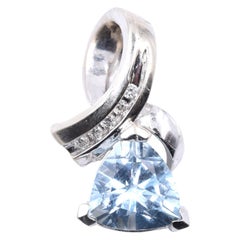 14 Karat White Gold Trillion Cut Blue Topaz and Diamond Pendant