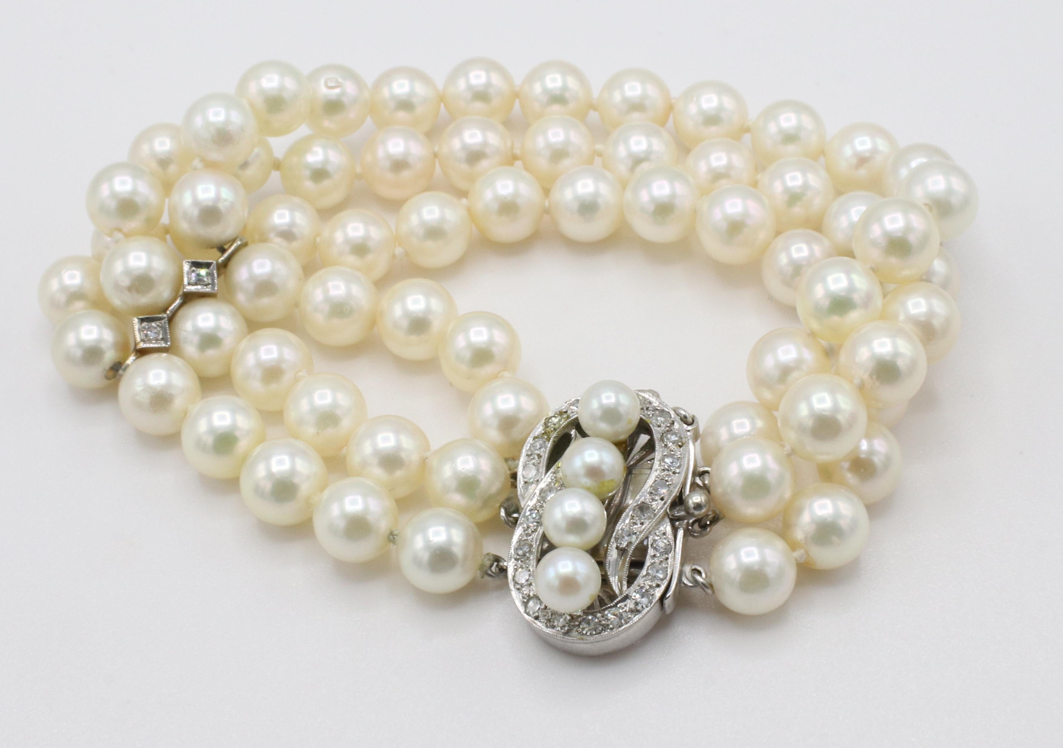 Women's 14 Karat White Gold Triple Strand Pearl & Diamond Bracelet