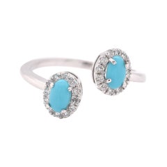 14 Karat White Gold Turquoise and Diamond Bypass Ring