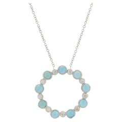 Collana a cerchio in oro bianco 14 carati con turchese e diamanti