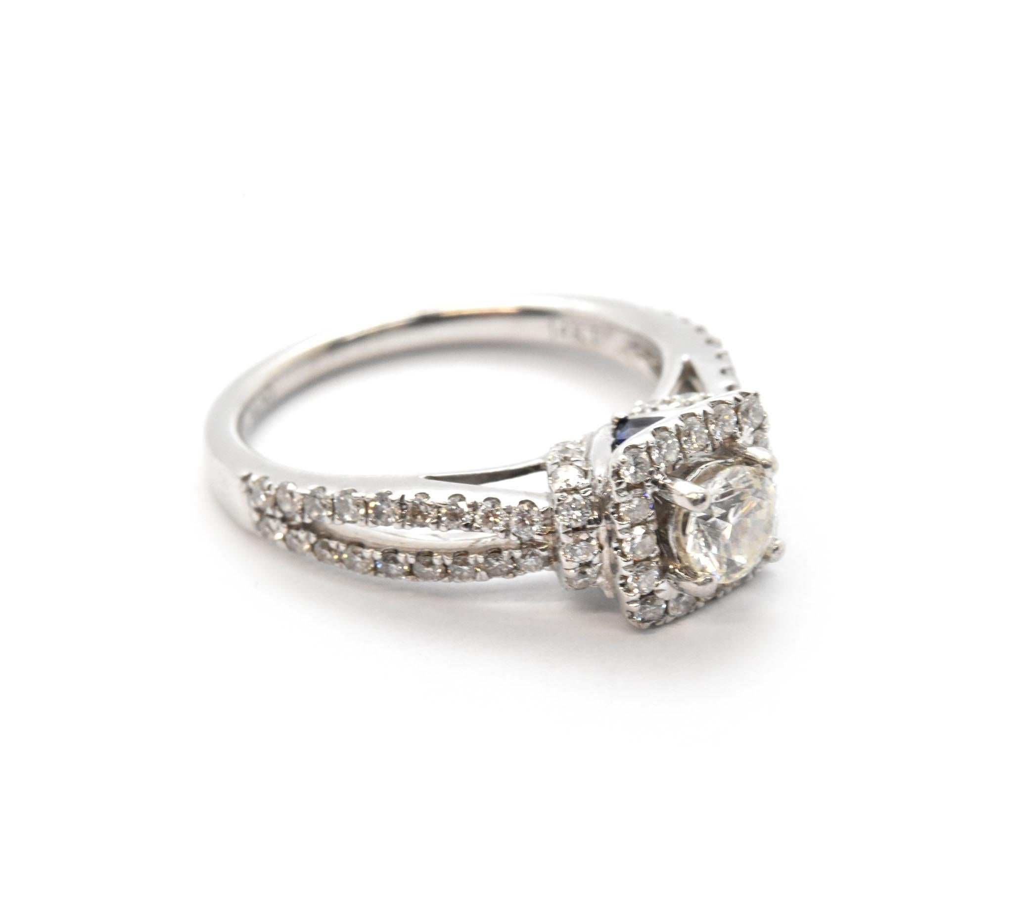 This is a charming 14k white gold engagement ring from the Vera Wang “Love” Collection. This ring delights with the round brilliant 0.38ct center diamond with a graceful diamond halo! The center diamond is graded I color and SI clarity. A total of