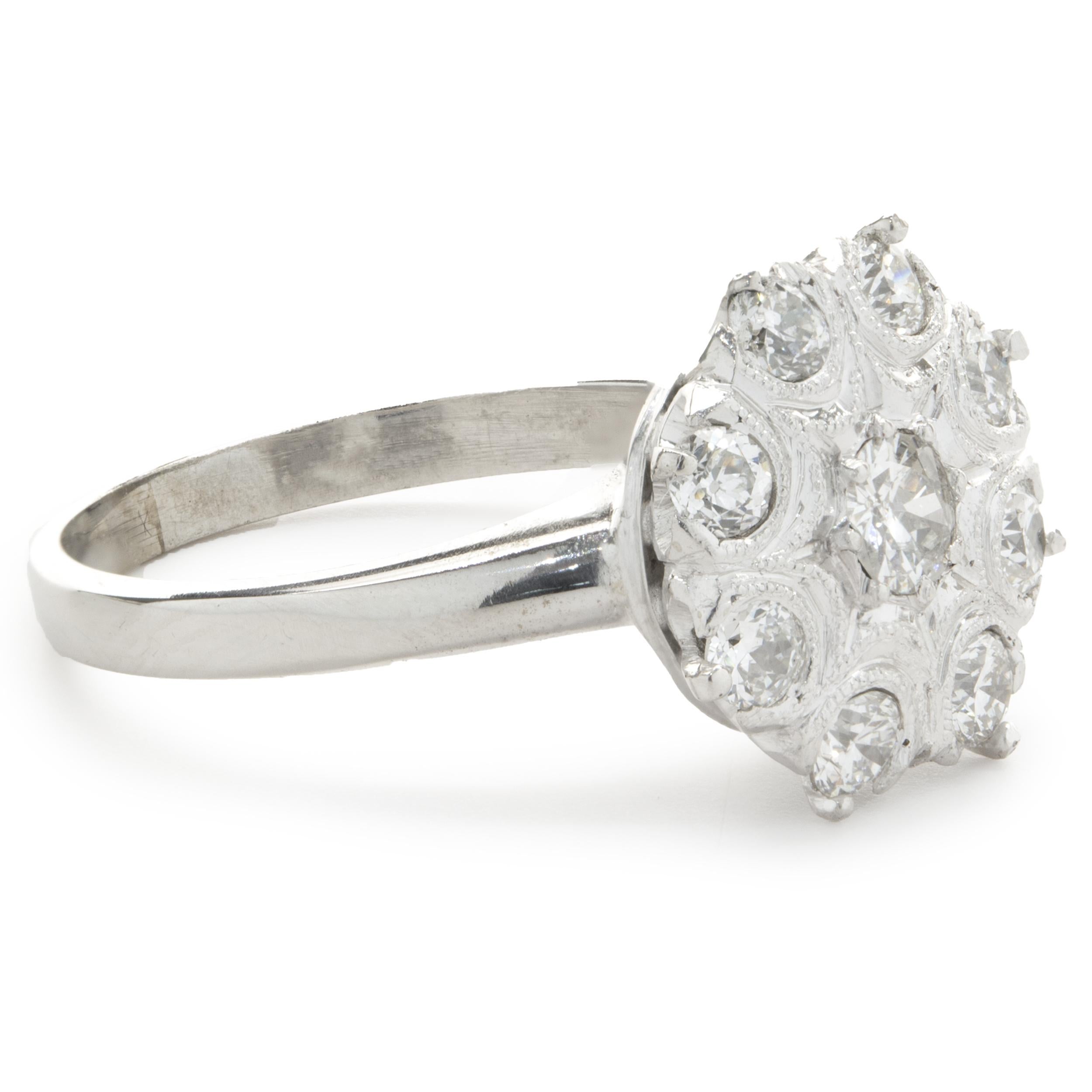 Designer: Custom
Material: 14k White Gold
Diamonds: 9 round brilliant cut = 0.45cttw
Color: H
Clarity: SI1
Size: 7 (complimentary sizing available)
Weight: 4.34 grams
