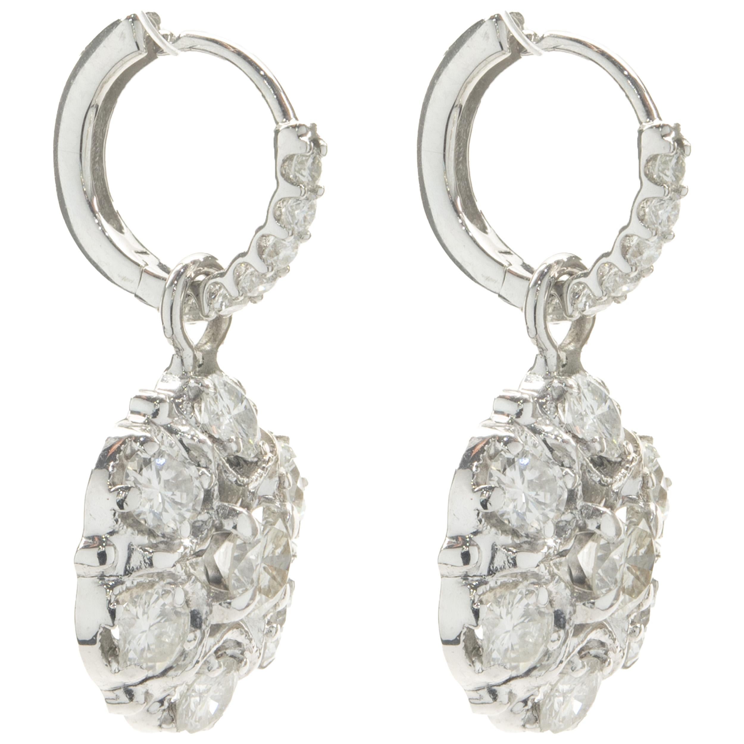 Designer: custom design
Material: 14K white gold
Diamond: 26 round brilliant cut = 3.38cttw
Color: G / H
Clarity: SI1
Dimensions: earrings measure 25.50mm long
Weight: 6.58 grams