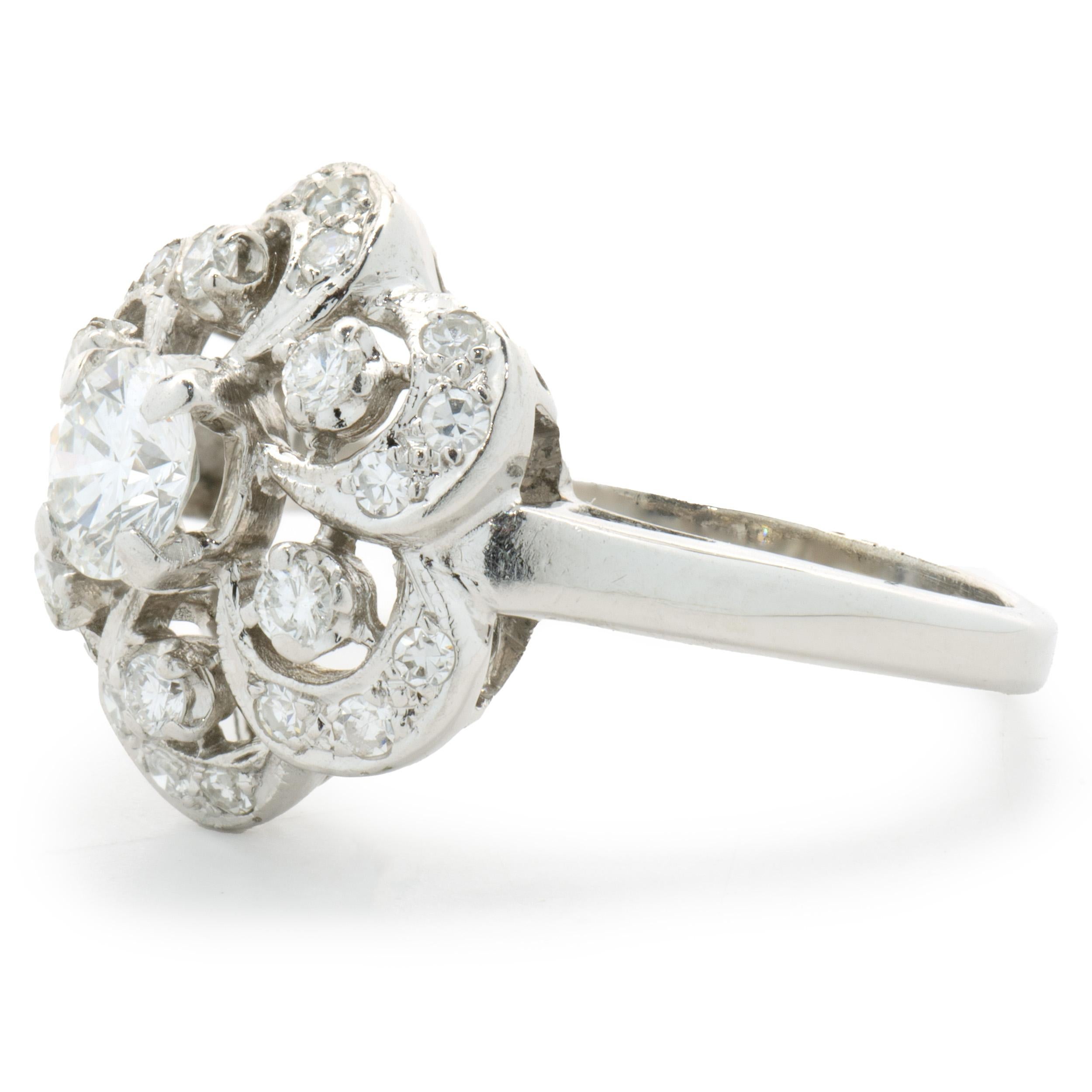 Designer: custom
Material: 14K white gold
Diamond: 1 round brilliant cut = 0.50ct
Color: H
Clarity: SI1
Diamond: 24 round cut = 0.36cttw
Color: G
Clarity: SI1
Size: 6.5 complimentary sizing available 
Weight: 4.34 grams