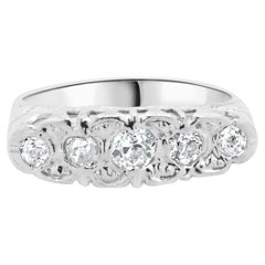 Bague Vintage en or blanc 14 carats à cinq diamants