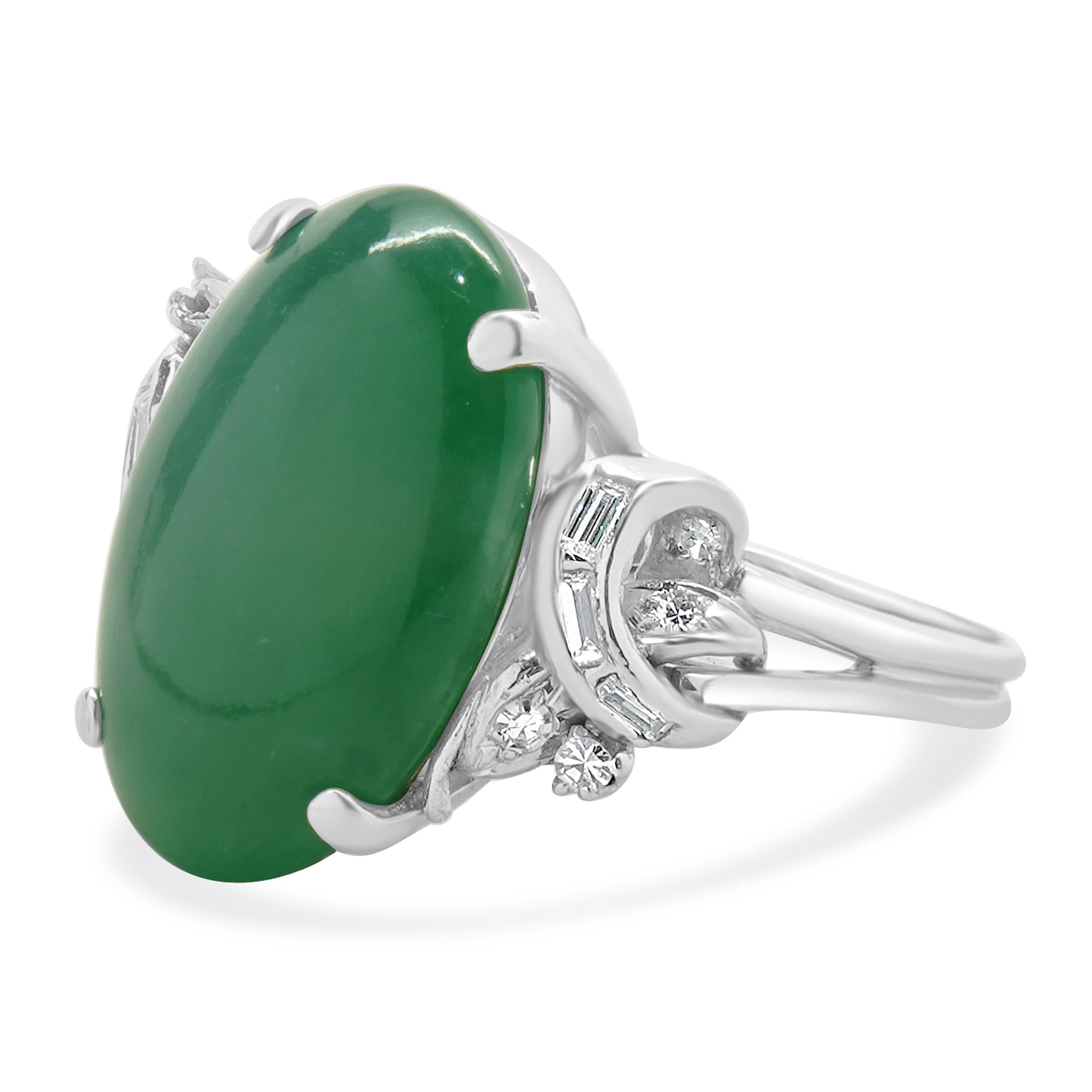 Designer: custom
Material: 14k white gold
Jade: 12.15cttw
Diamond: 14 round and baguette cut = 0.25cttw
Color: I
Clarity: SI1
Ring Size: 9 (please allow two extra shipping days for sizing requests) 
Weight: 7.18 grams
