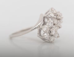 14 Karat White Gold Vintage Round Cut Diamond Floral Ring