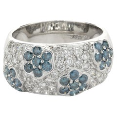 14 Karat White Gold White and Blue Diamond Flower Band