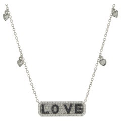 14 Karat White Gold White
Black Diamond Love Bar Necklace 14 Karat White Gold White
Black Diamond Love Bar Necklace
