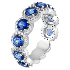 14 Karat White Gold White Diamond with Blue Sapphire Ring