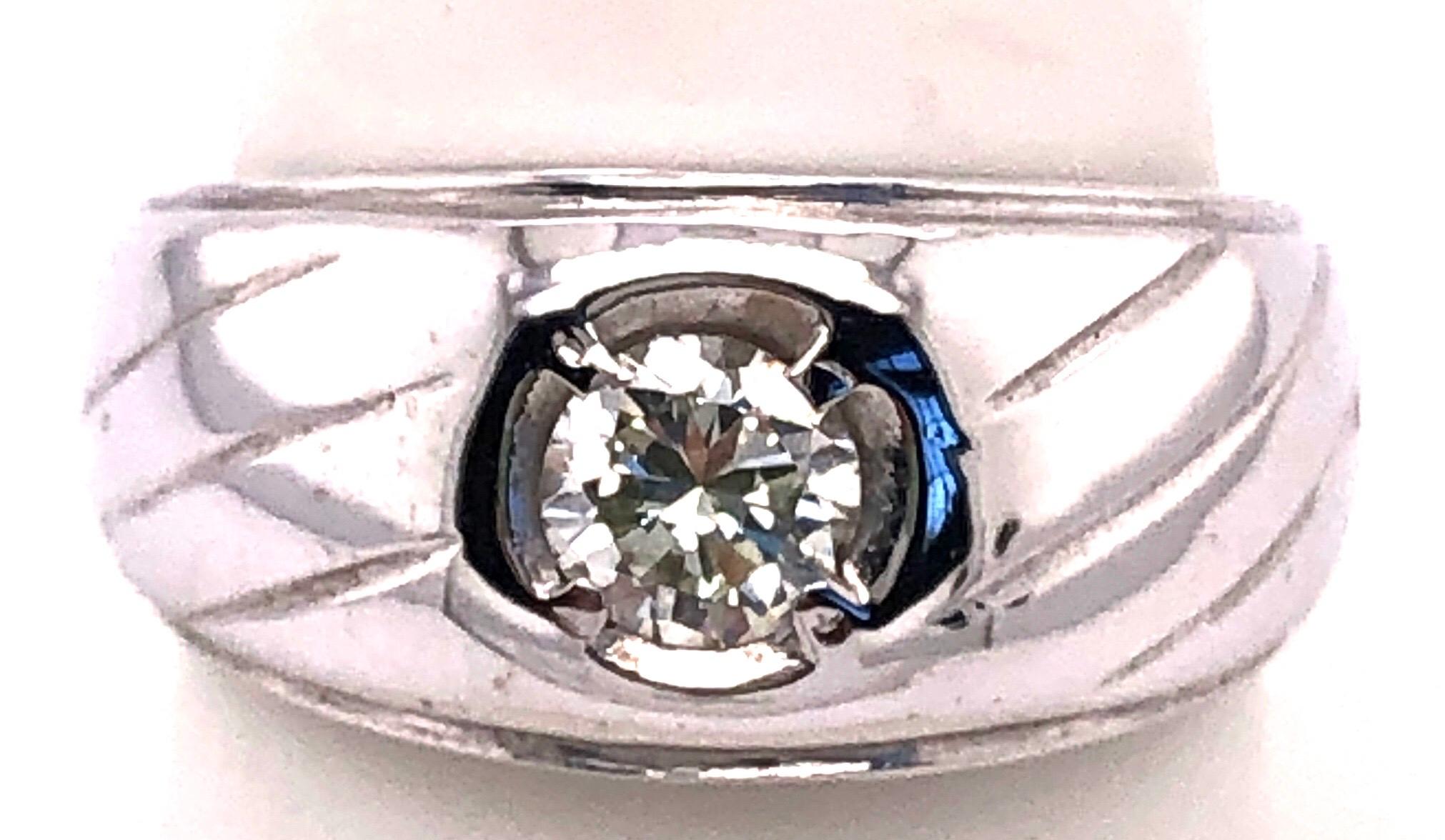 bague de mariage en or blanc 14 carats avec solitaire en diamant 
0.50 Poids total des diamants.
Taille 9
12.poids total de 61 grammes.
