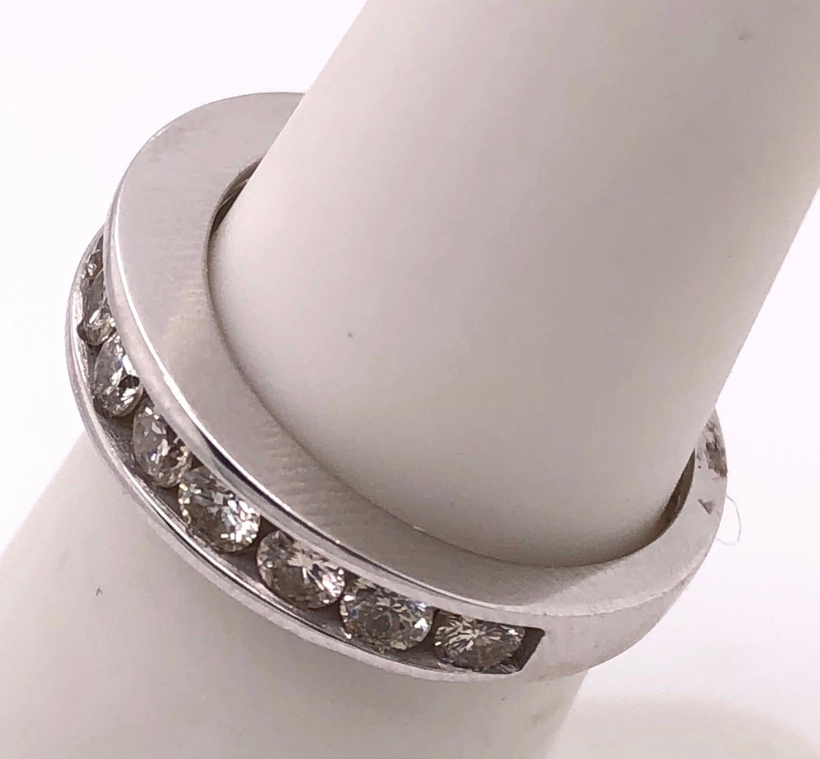 14 karat White Gold Band/Bridal ring with Diamonds 1.20 Total Diamond Weight.
Size 5
3.48 grams total weight.
