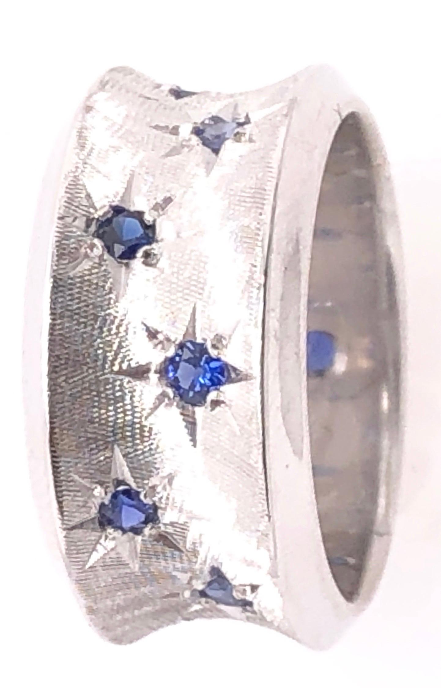 14 Karat White Gold Fashion Ring with Round Sapphires.
Size 6
9.05 grams total weight.