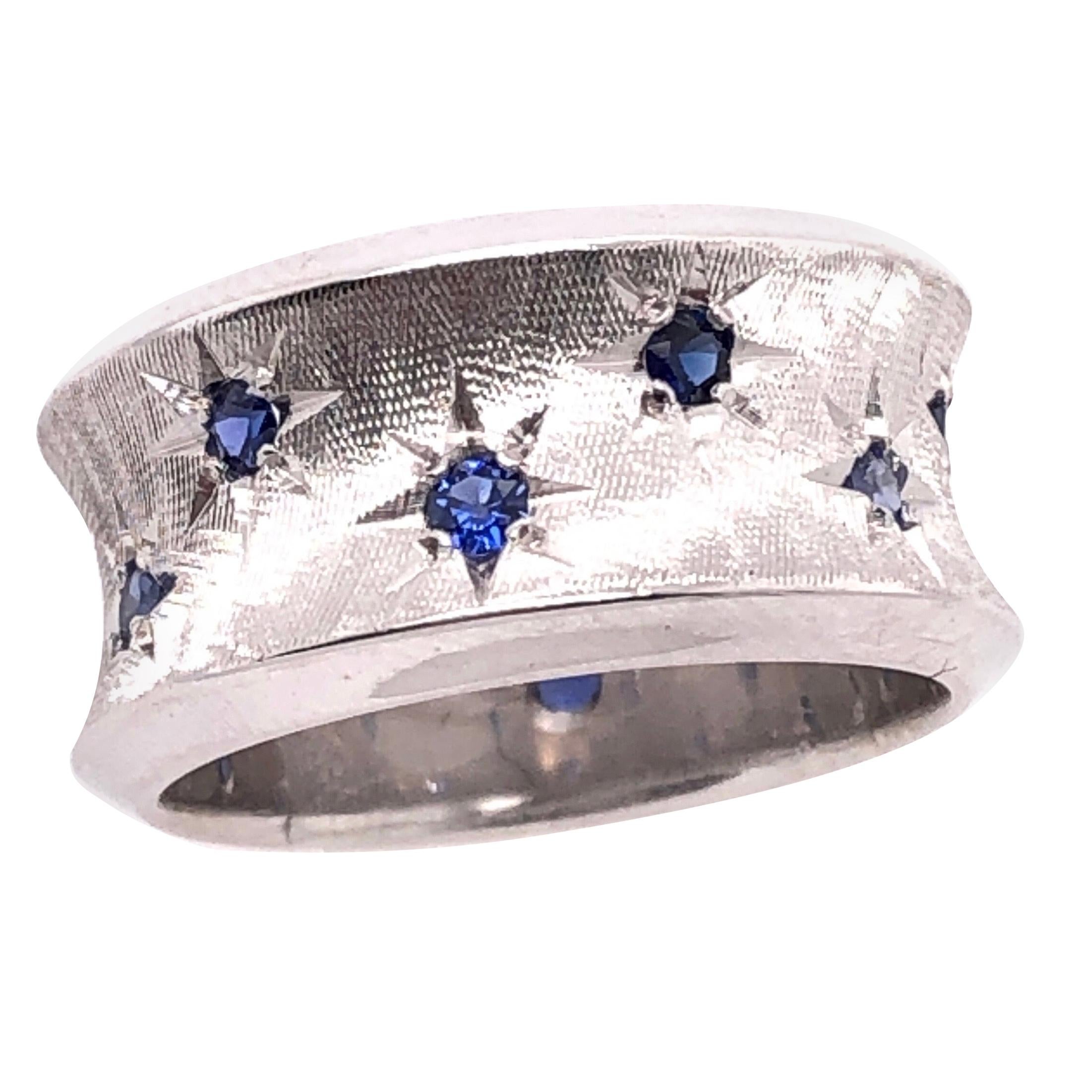 Anillo de moda de oro blanco de 14 quilates con zafiros redondos