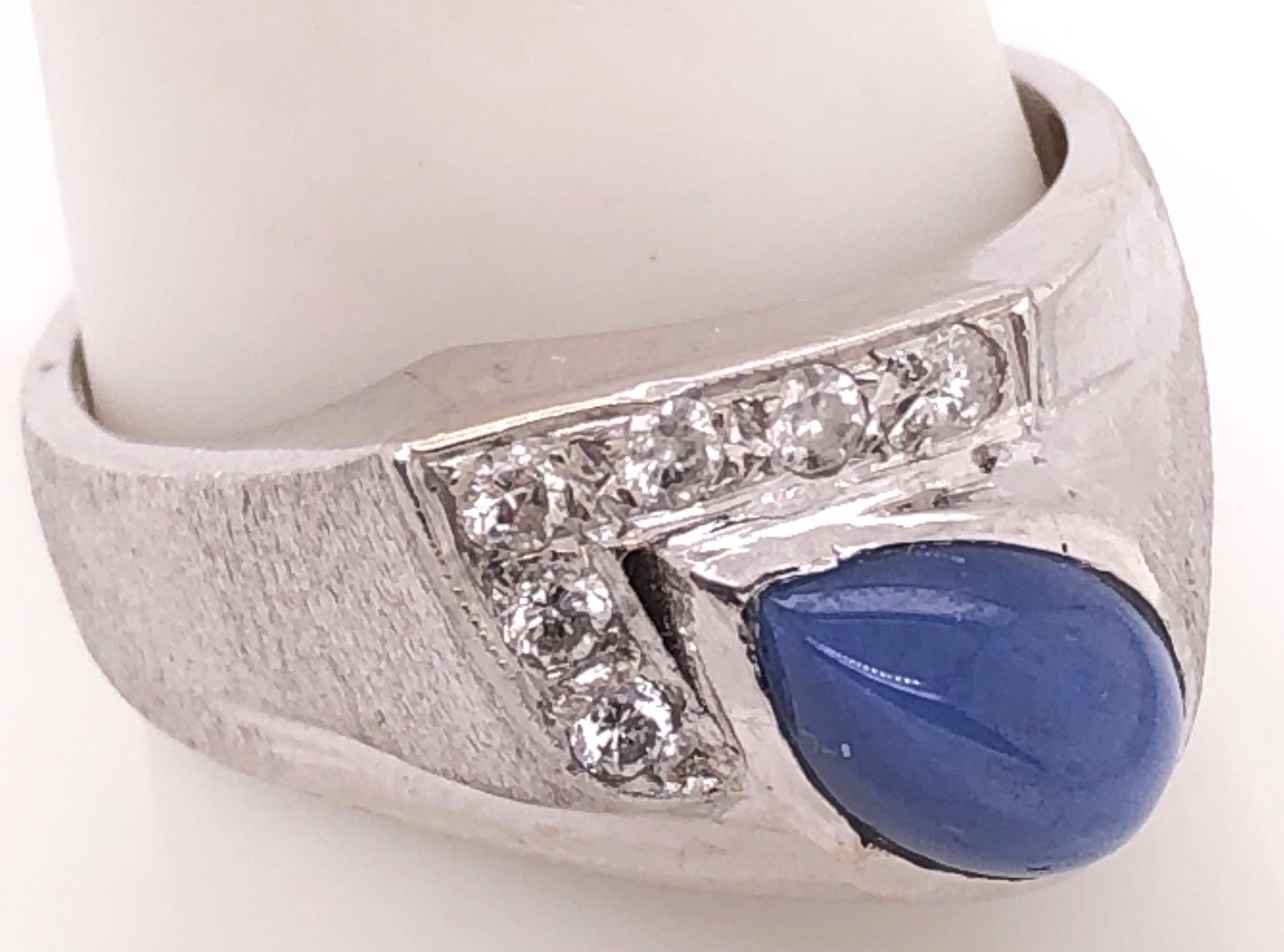 Contemporary 14 Karat White Gold With Teardrop Sapphire Cabochon Ring with Diamond Accents For Sale