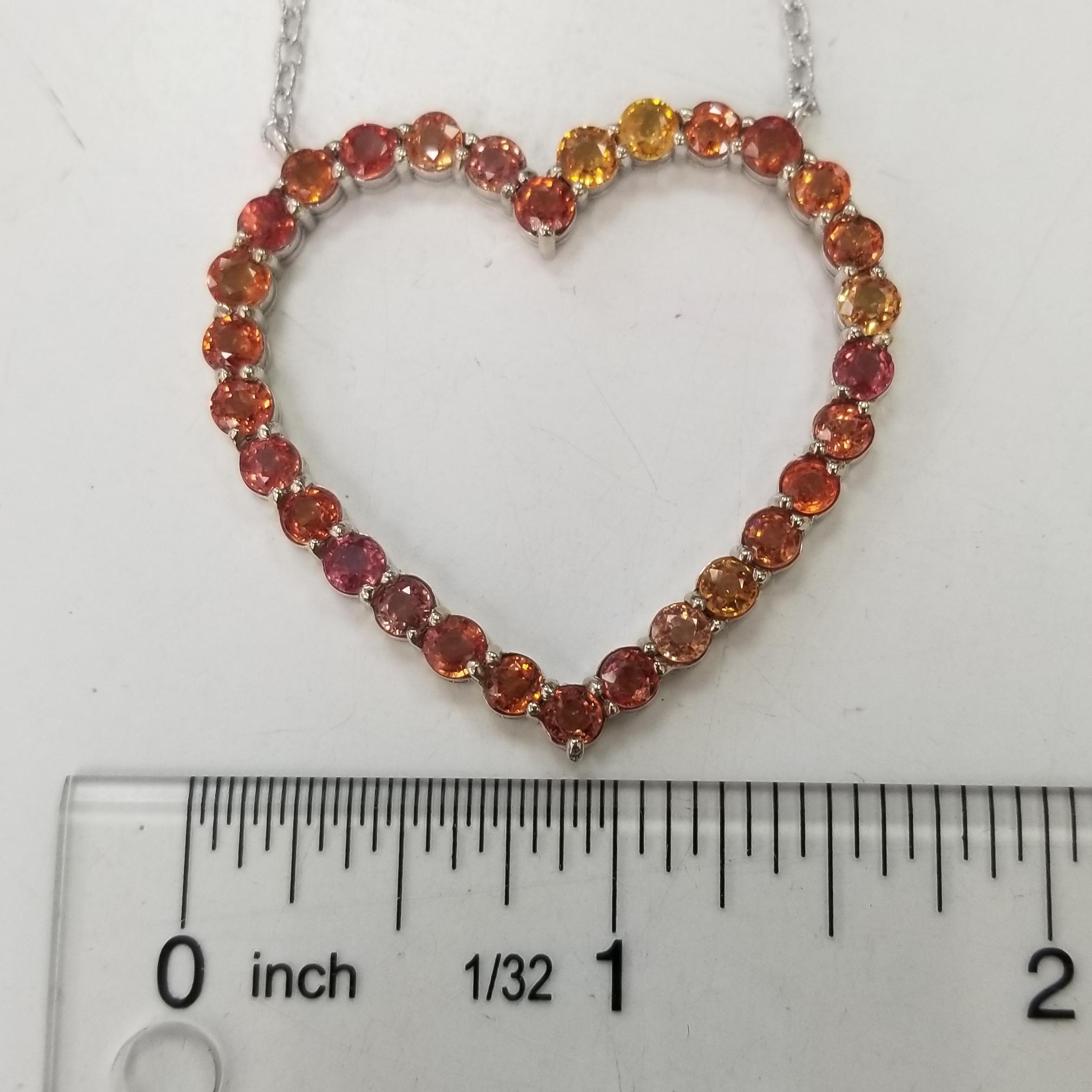 Contemporary 14 Karat White Gold Yellow and Orange Sapphires Heart Pendant Weighing 8.01 Cts For Sale