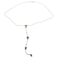 14 Karat White Gold Yellow Thai Sapphire and Diamond Drop Style Necklace