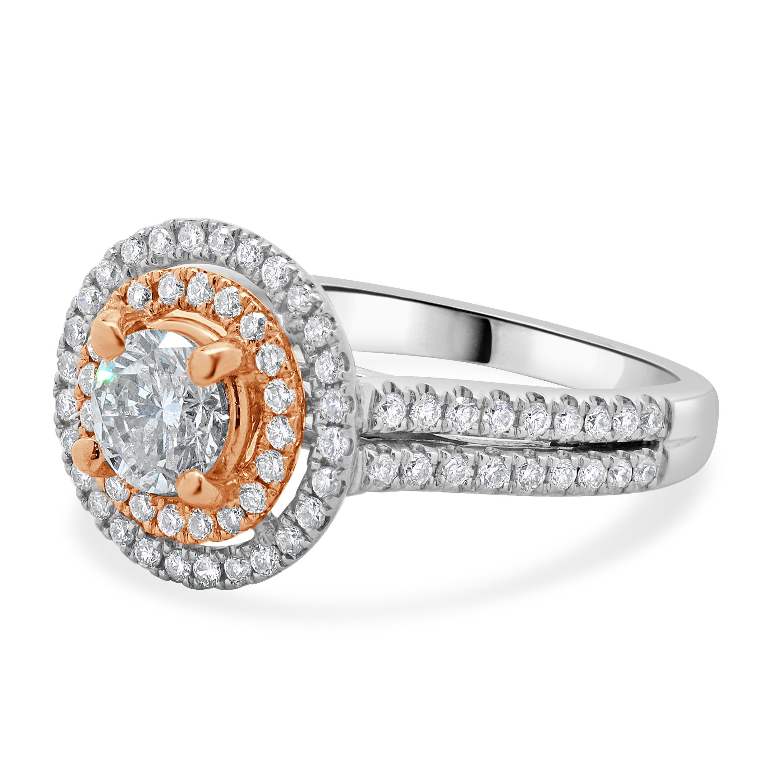 Designer: custom design
Material: 14K white & rose gold
Center Diamond: 1 round brilliant cut = 0.67ct
Color : G
Clarity : I1
EGL: US310107218D
Diamond: 84 round brilliant cut = 0.50cttw
Color : H / Pink
Clarity : I1-2
Dimensions: ring top measures