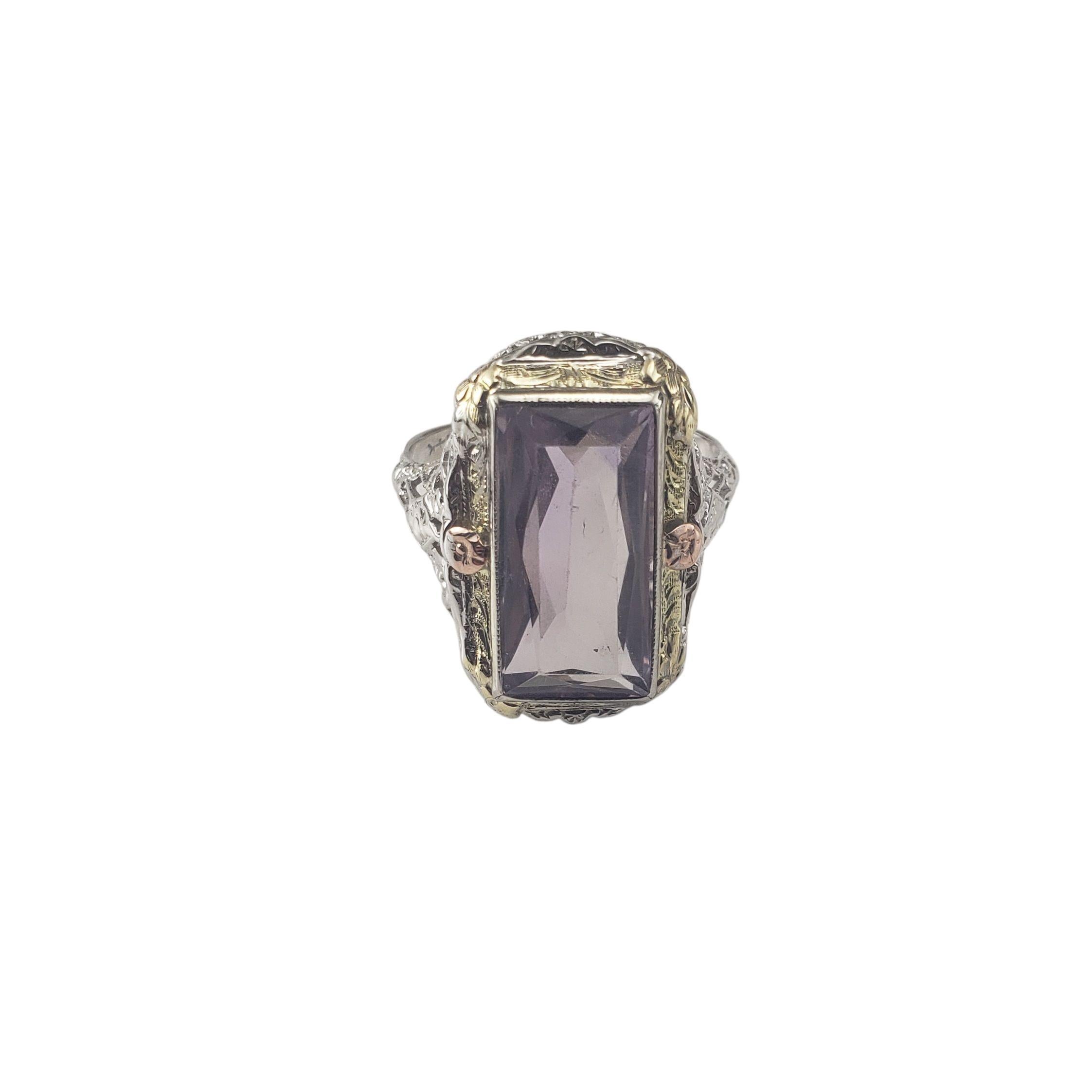 14K White Yellow and Rose Gold Filigree Amethyst Ring Size 7-

This elegant ring features a rectangular cut amethyst (16.9 mm x 8.8 mm) set in beautifully detailed 14K white, yellow and rose gold filigree, showcasing intricate openwork and delicate