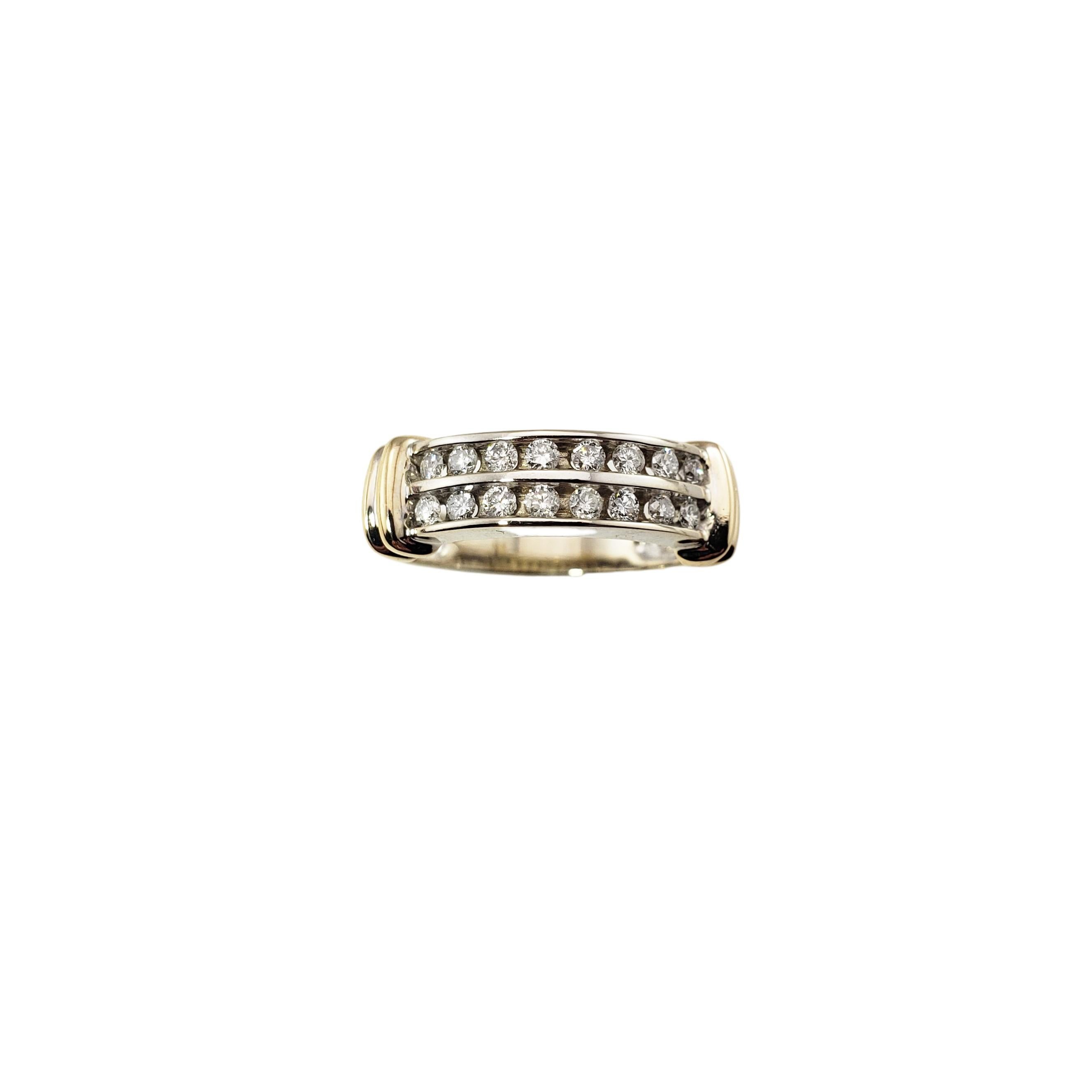 14 Karat White/Yellow Gold and Diamond Ring Size 7-

This sparkling ring features 16 round brilliant cut diamonds set in classic 14K white and yellow gold.  Width:  5 mm.  Shank:  3 mm.

Approximate total diamond weight: .48 ct.

Diamond color: