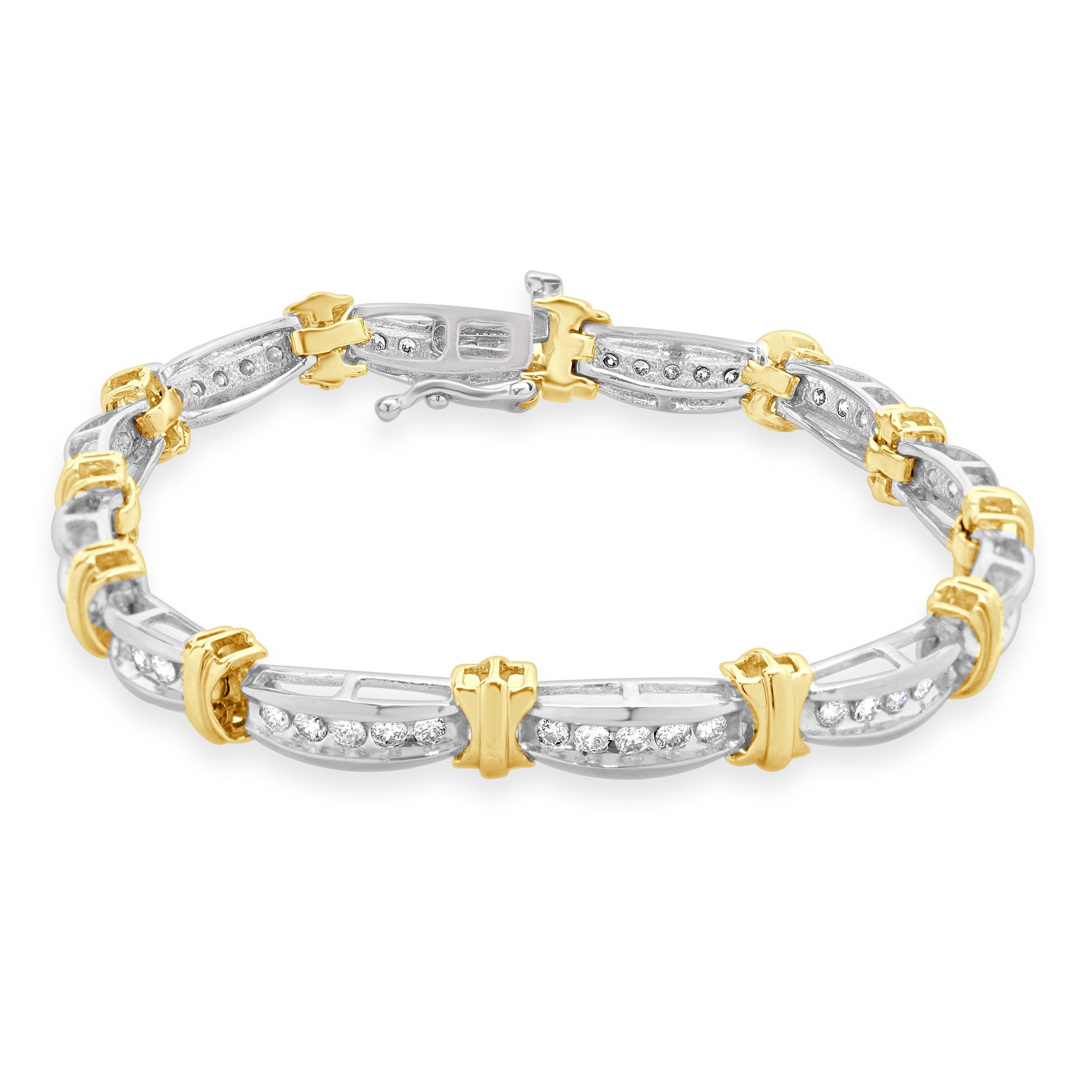 Designer: custom
Material: 10K white & yellow gold
Diamond: 60 round brilliant cut = 1.50cttw
Color: H
Clarity: I1
Dimensions: bracelet will fit up to a 7.25-inch wrist
Weight: 13.86 grams
