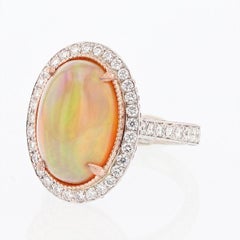 14 Karat White and Rose Gold Oval Opal, Pink Sapphire, and Diamond Ring