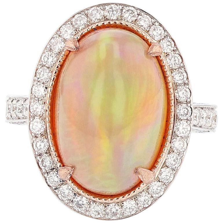 14 Karat White and Rose Gold Oval Opal, Pink Sapphire, and Diamond Ring