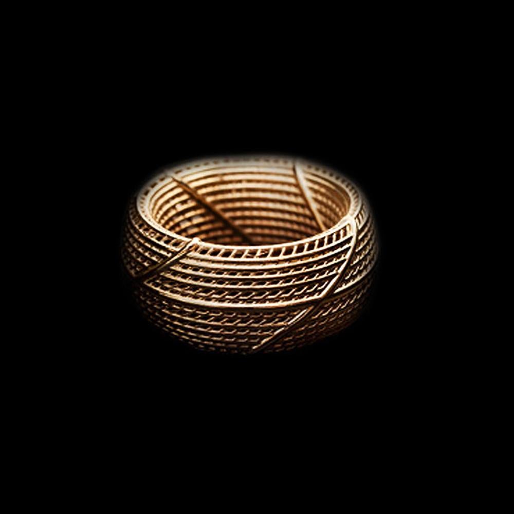 Netline Wide Wedding ring - 14k Gold

This amazing ring made with a 3D printing technique in 14k  solid gold. Design with net texture. 
The manufacturing process results in a hollow object shaped like a rounded tube. Its rounded sides make it