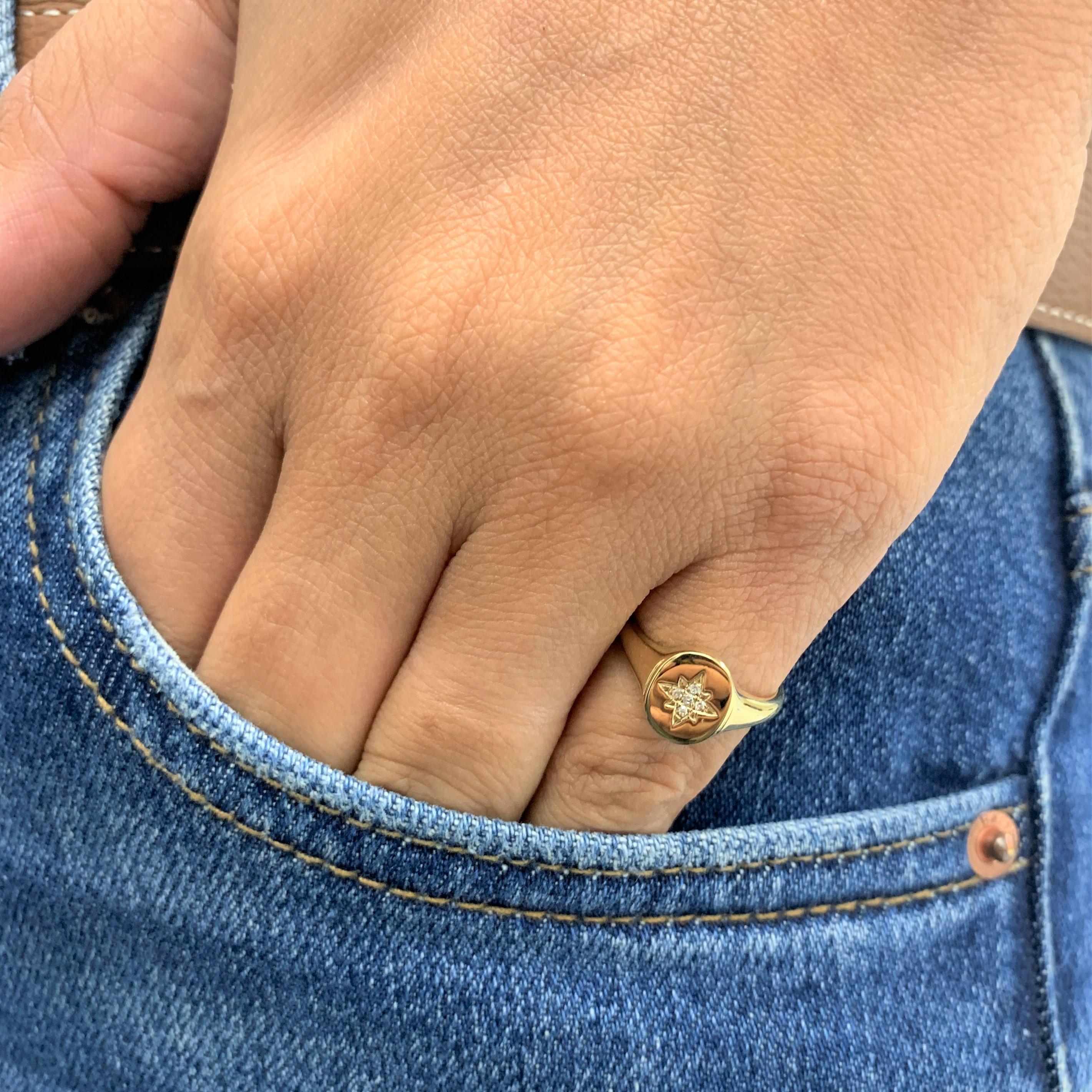 Add this precious Diamond Signet ring to your look! Crafted of 14K gold and available in Yellow, Rose & White Gold, this ring features 0.02 carats of Natural Round Diamonds. Its a pinky ring size 4.
-14K Gold
-5 Diamonds 0.02 carats
-Color & Clarity