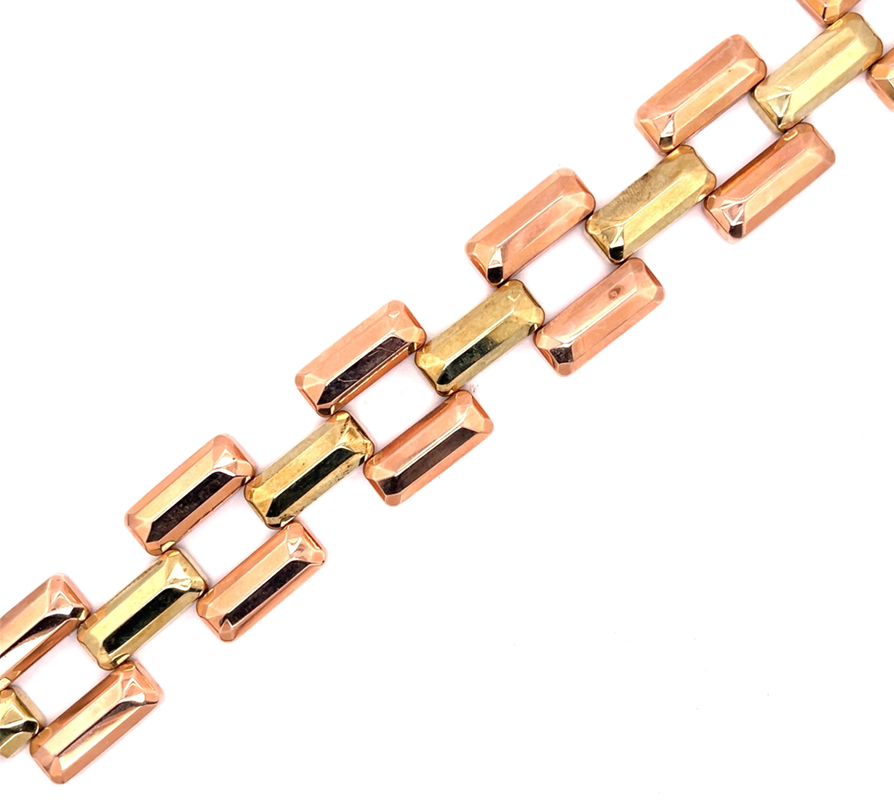 14 Karat Yellow and Rose Gold  8.5 Inch Bracelet. This stunning two tone bracelet shows just how long love can last. Dated 1953 and initialed this finely crafted contemporary piece has certainly stood the test of time when  style and grace are