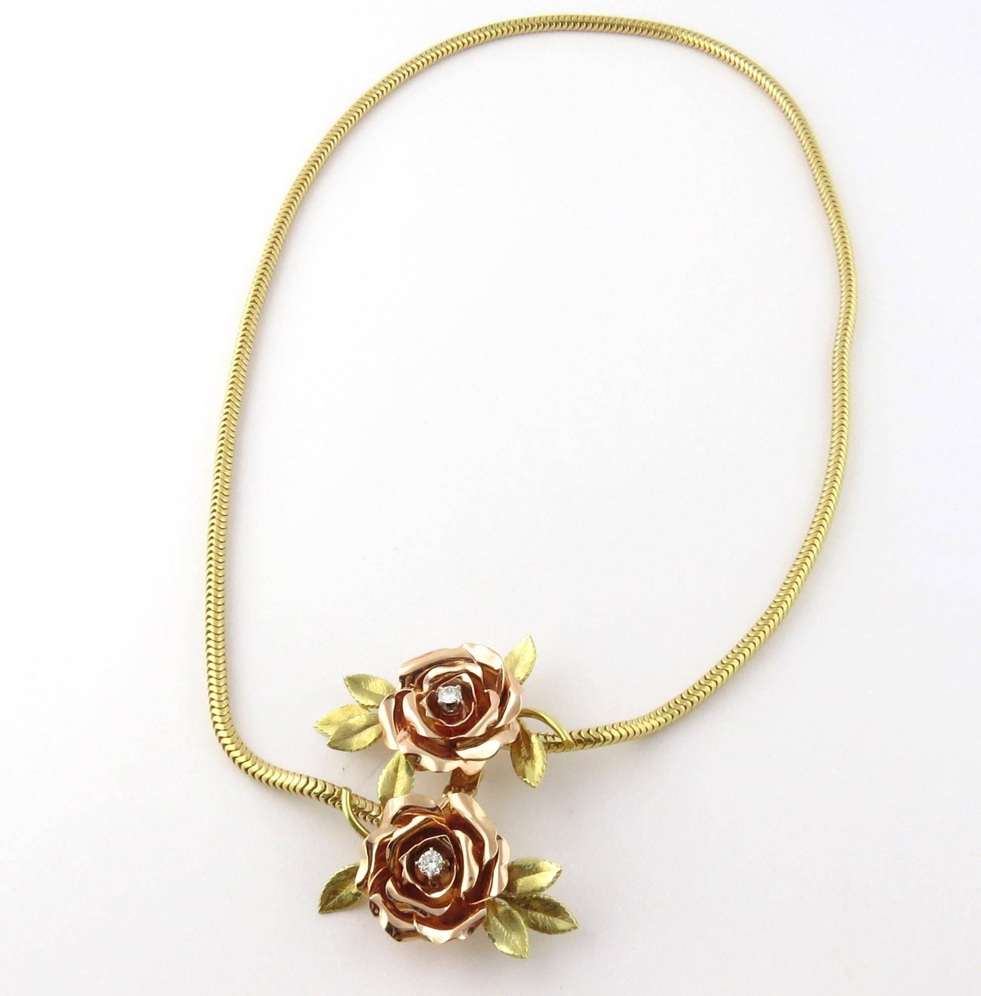 Vintage 14K Yellow and Rose Gold Rose Necklace 

This beautifully detailed necklace shows amazing craftsmanship. 

Two roses are found at each end of the snake chain. The petals are individually crafted out of rose gold. A hidden tension clasp gives