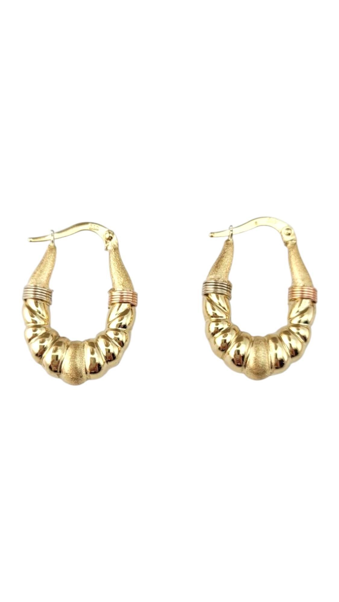 14 Karat Yellow and Rose Gold Shrimp Hoop Earrings

Crafted in 14-karat yellow gold with rose gold accents,  these oval hoop earrings feature a distinctive shrimp design that stands out with texture and shine.

Size: 25.4 mm X 17.4 mm X 5.7