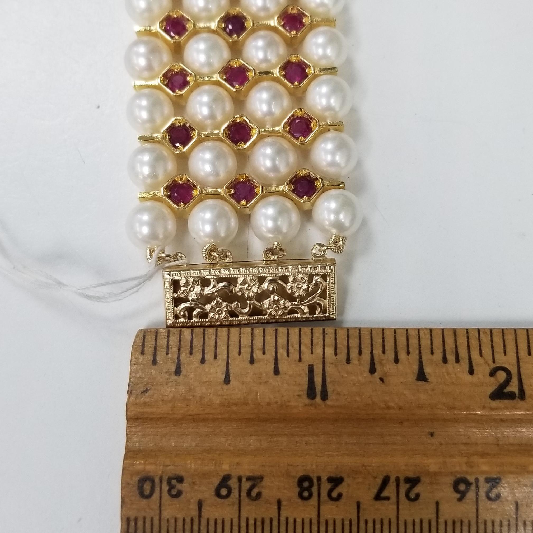 Round Cut 14 Karat Yellow and Silver Gold-Plated 4-Row of Cultured Pearl and Ruby Bracelet For Sale