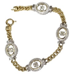 14 Karat Yellow and White Diamond Bracelet with "Dancing" Diamonds in the Middle