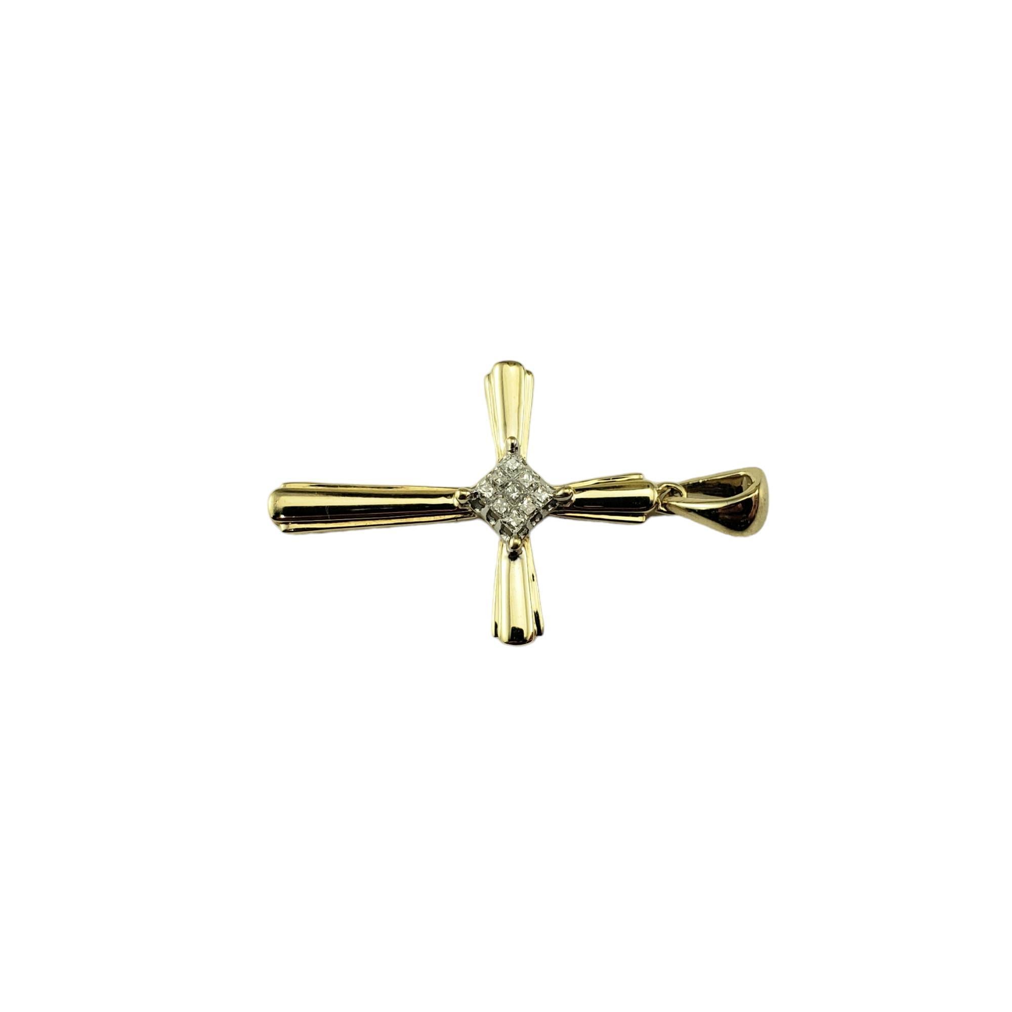 14 Karat Yellow and White Gold and Diamond Cross Pendant-

This lovely yellow gold cross pendant features nine princess cut diamonds set in classic 14K white gold prongs.

Total diamond weight: .25 ct.

Diamond color: I-J

Diamond clarity: