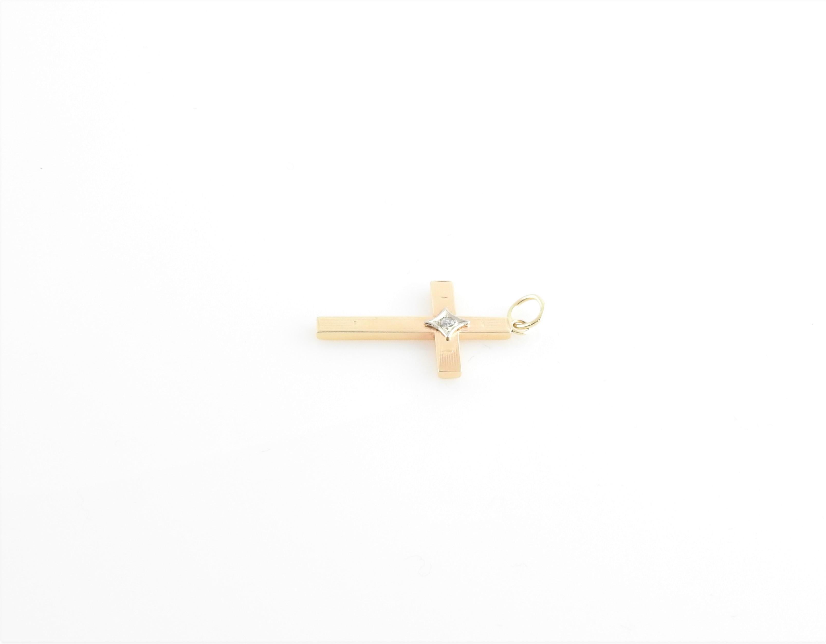 Women's 14 Karat Yellow and White Gold and Diamond Cross Pendant