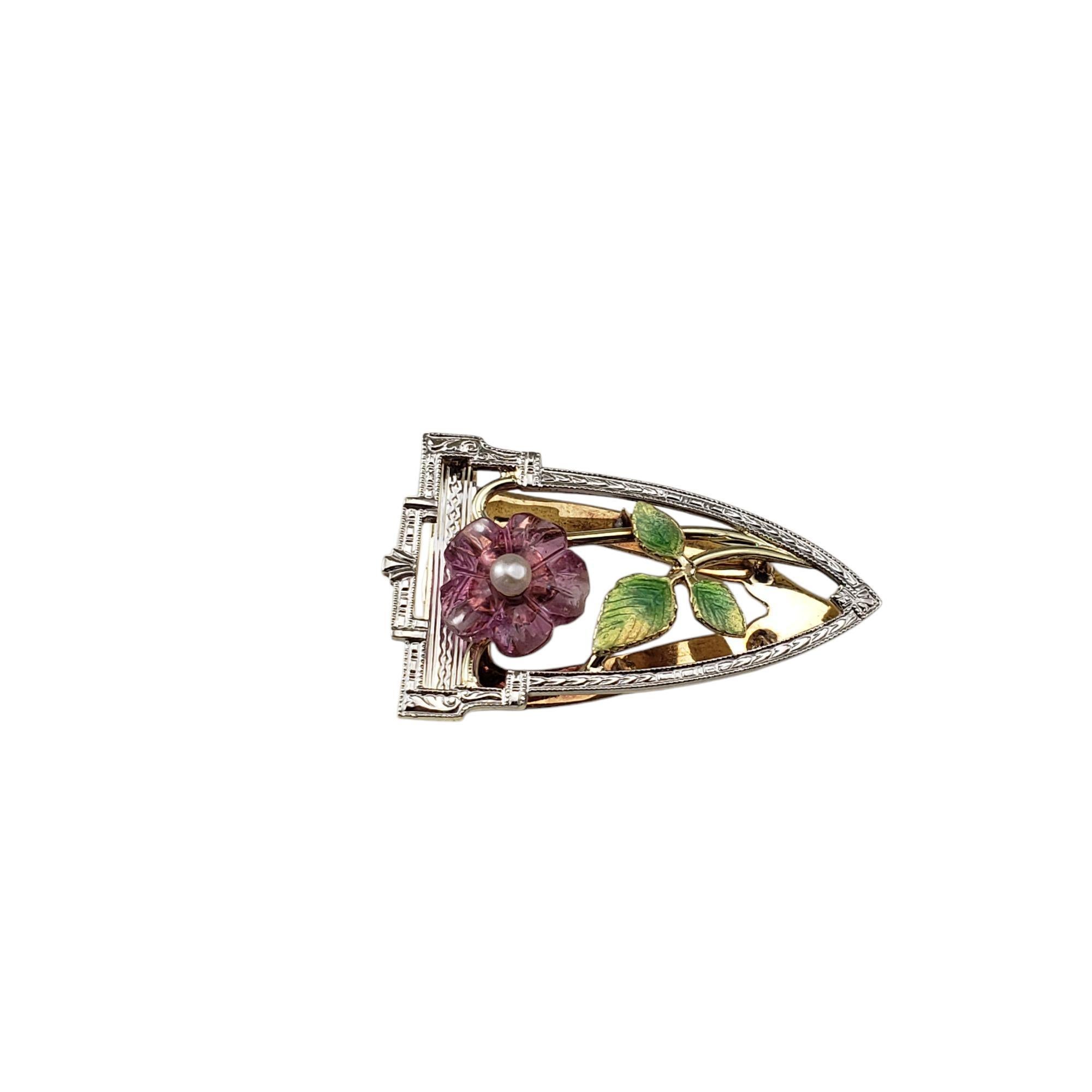 14 Karat Yellow Gold and Enamel Floral Clip Pendant-

This stunning 14K yellow gold piece features a floral theme crafted in pressed glass and colorful enamel.

Can be worn as a clip or a pendant

Size: 26 mm x 16 mm

Weight: 1.8 dwt./ 2.8