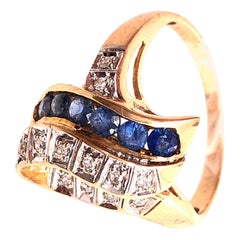 14 Karat Yellow and White Gold Blue Sapphire and Diamond Contemporary Ring