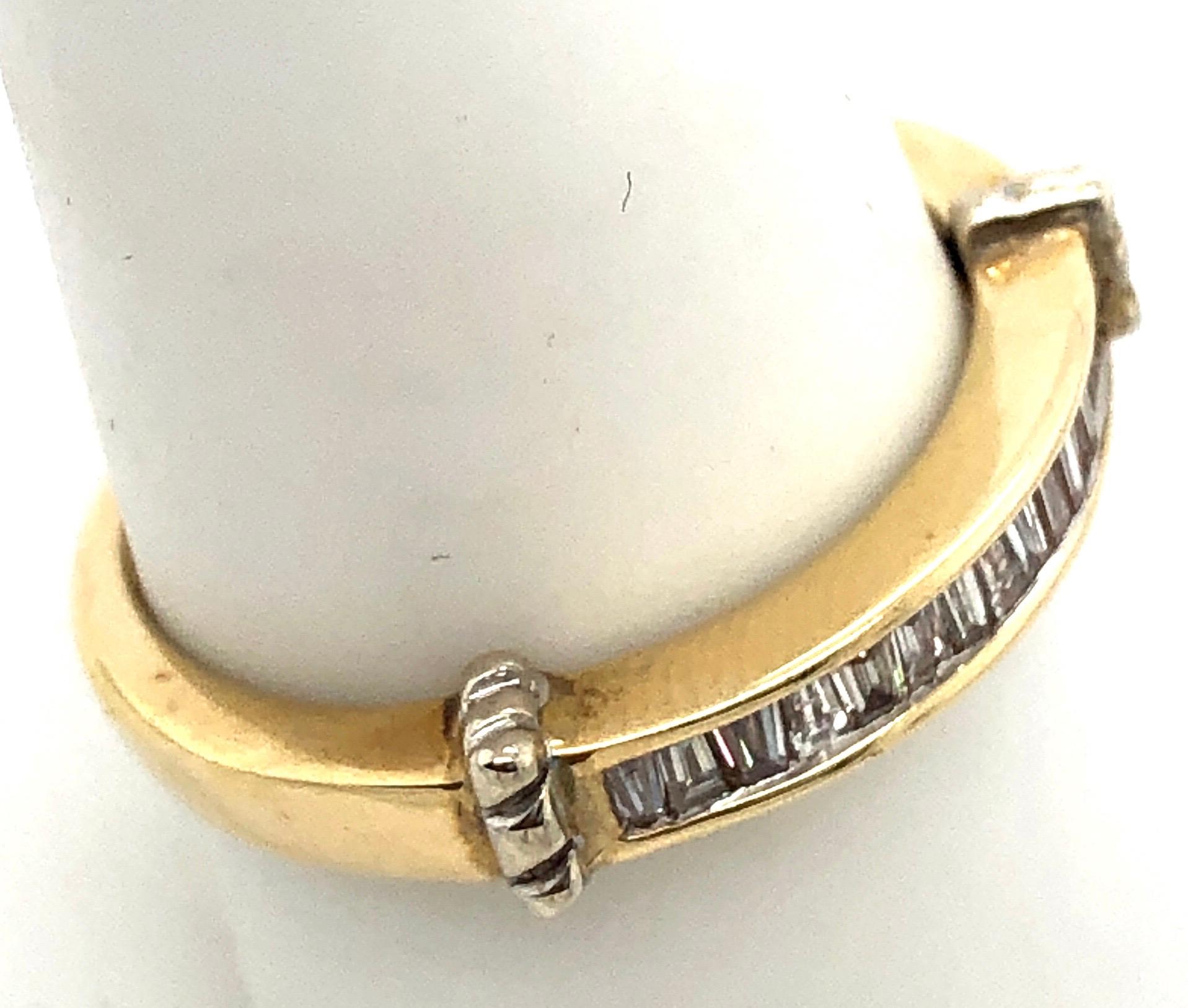 14 Karat Yellow and White Gold Band Ring with Baguette Diamonds Size 8.5.
0.50 total diamond weight.
3 grams total weight.
