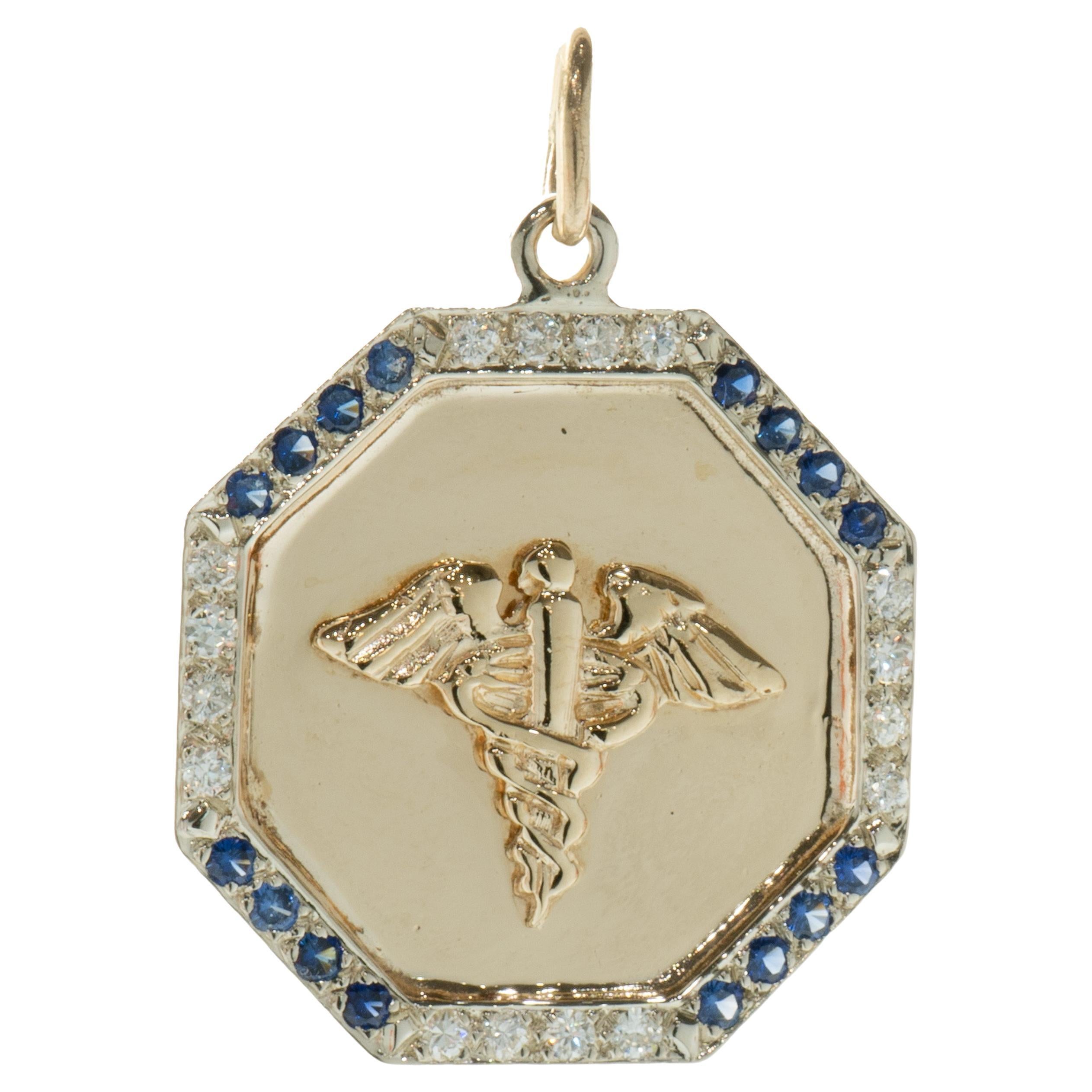 14 Karat Yellow and White Gold Diamond and Sapphire Medic Pendant For Sale
