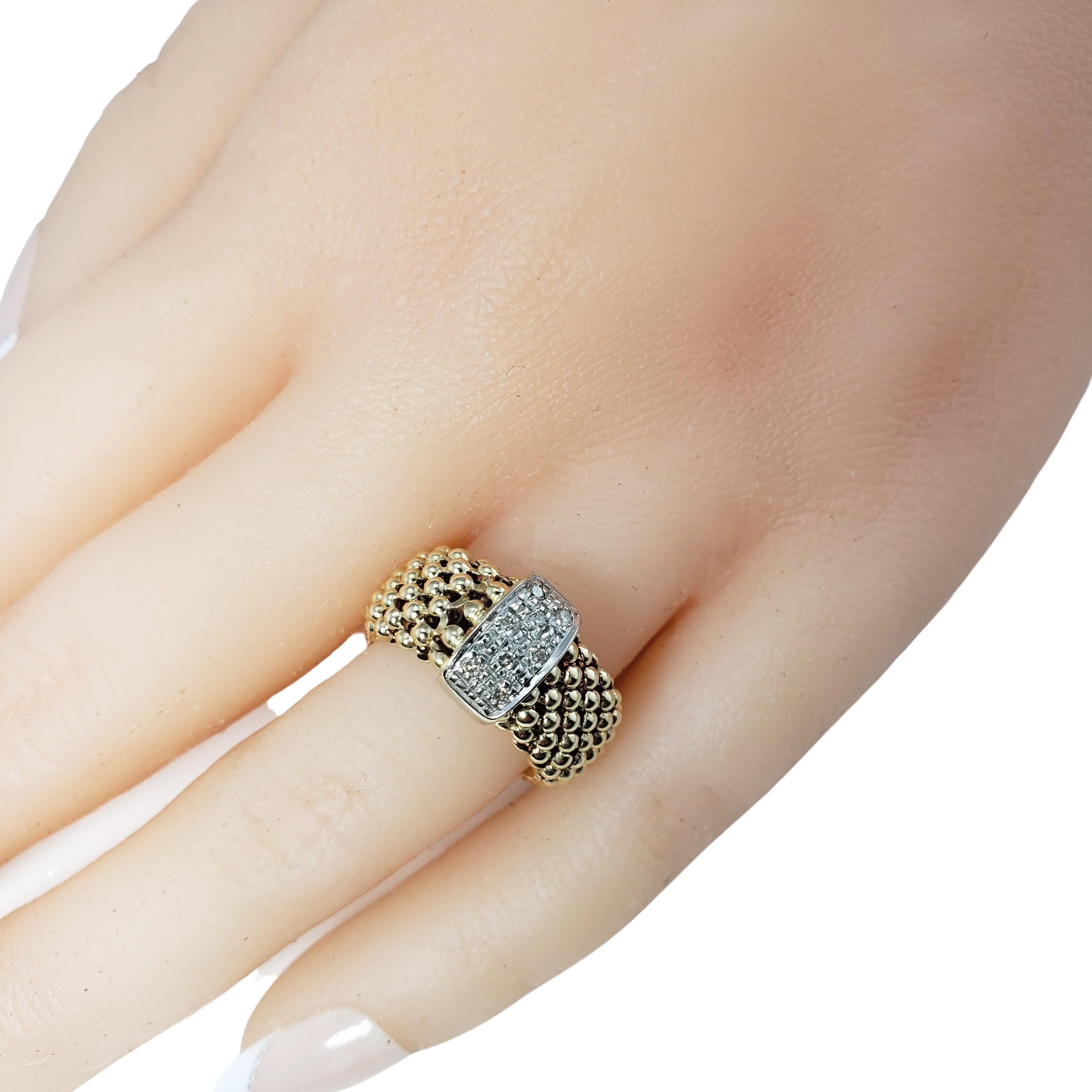 Vintage 14 Karat Yellow and White Gold and Diamond Mesh Band Ring Size 8-

This lovely flexible mesh band is accented with eight round brilliant cut diamonds set in 14K white gold. Mesh band is 14K yellow gold.

Width: 10 mm.

Approximate total