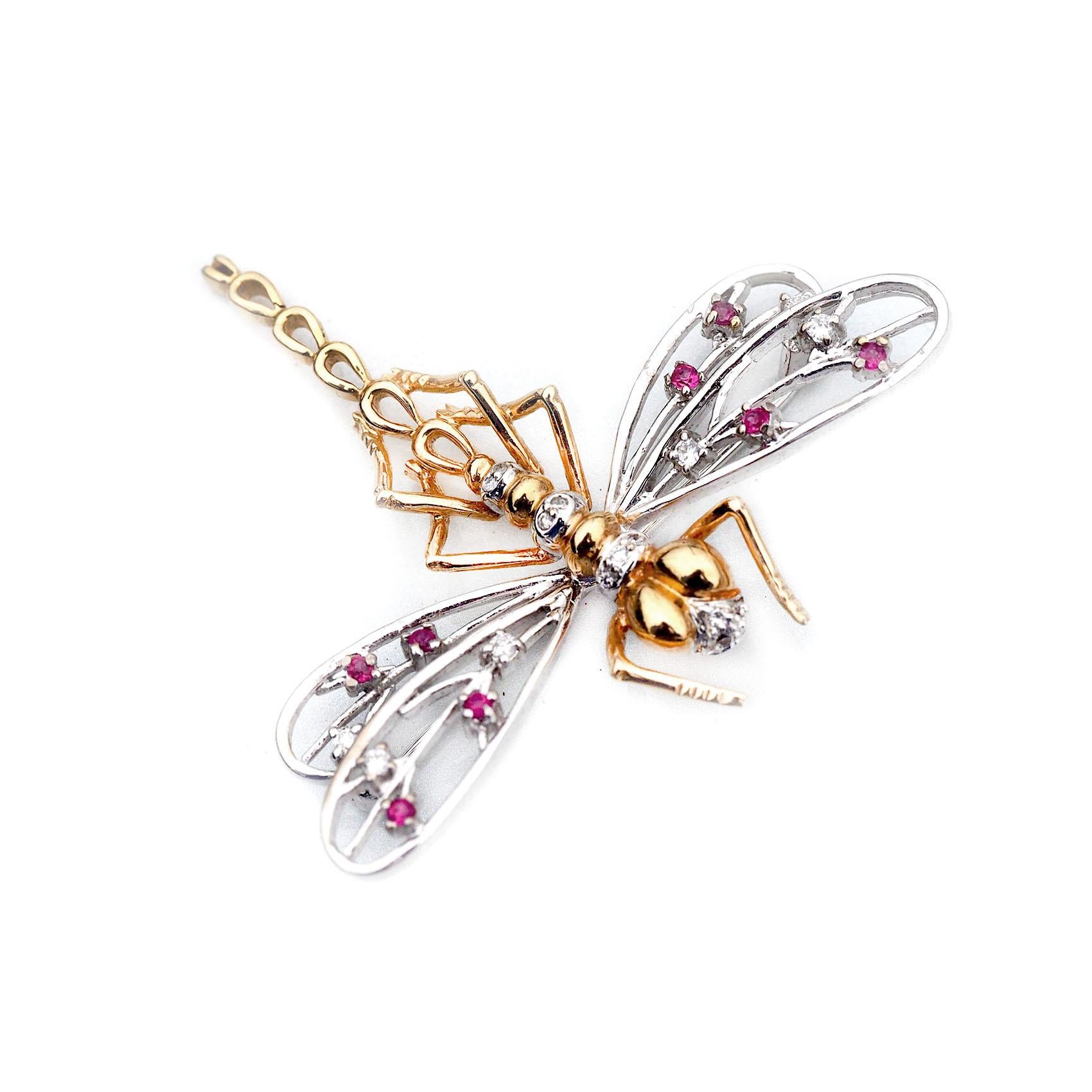 Please see this 14k Yellow and White Gold Dragonfly Ruby and Diamond Pin. I have shot images from various angles so you can see it completely (both front and back). This piece weighs 6.5 grams total. 