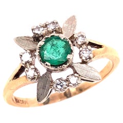 14 Karat Yellow and white Gold Emerald Solitaire with Diamond Accents Ring