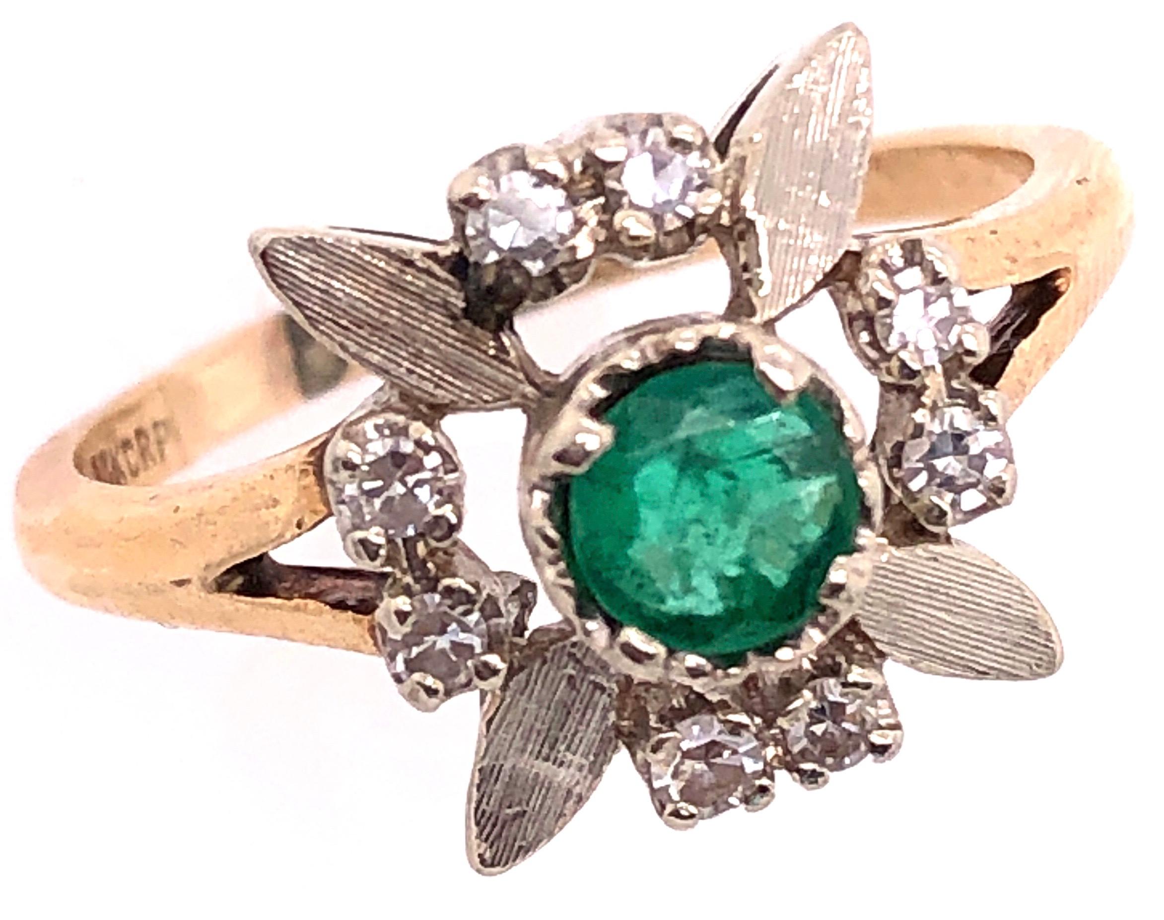 Modern 14 Karat Yellow and white Gold Emerald Solitaire with Diamond Accents Ring For Sale