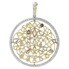 14 Karat Yellow and White Gold Fancy Diamond Circle Pendant with Diamond Halo