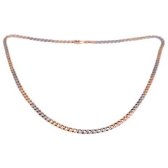 14 Karat Yellow and White Gold Flat Cuban Link Chain 14 Karat Yellow and White Gold Flat Cuban Link Chain