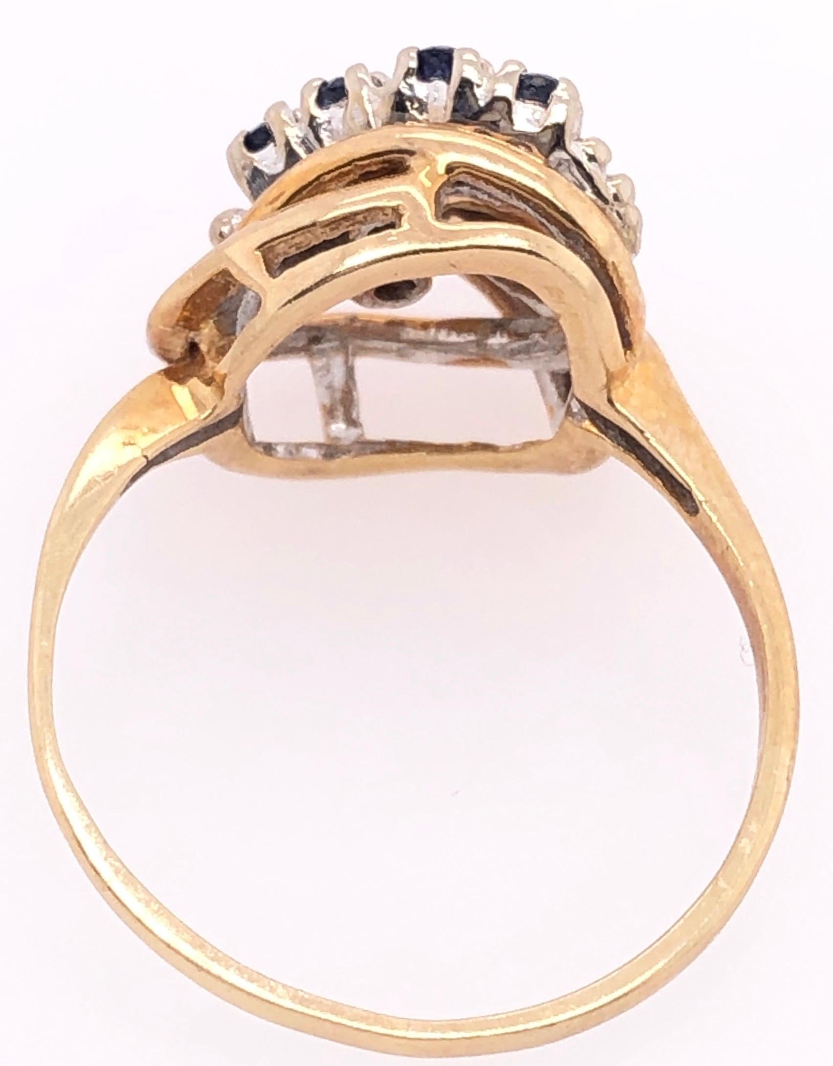 Round Cut 14 Karat Yellow and White Gold Freeform Ring with Sapphires and Diamonds For Sale