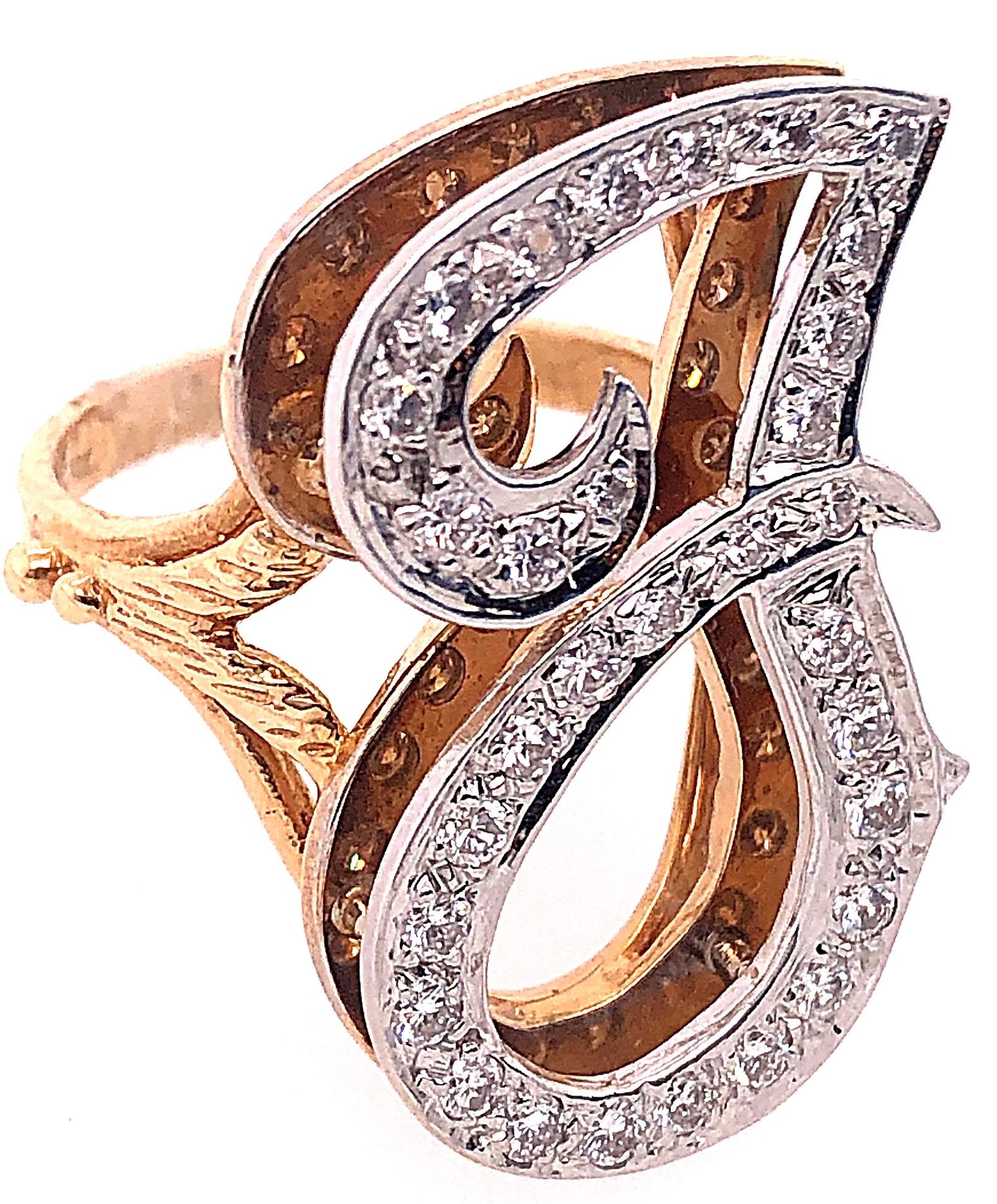 14 Karat Yellow and White Gold Initial Style 'J' Diamond Studded Ring
32 piece round diamonds with 1.00 total diamond weight.
Size 7
8 grams total weight.
Initial's Height: 28 mm Width: 16 mm
*This ring can be resized at your local jeweler.