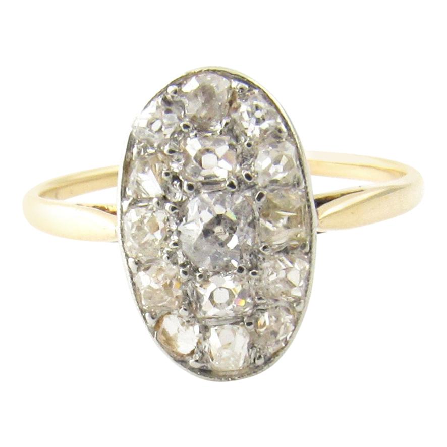 14 Karat Yellow and White Gold Oval Old Mine Diamond Ring