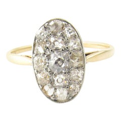 14 Karat Yellow and White Gold Oval Old Mine Diamond Ring